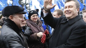 Presidential candidate Viktor Yanukovych greets supporters in the town of Yenakiyevo last week. The Ukrainian opposition leader faces Prime Minister Yulia Tymoshenko in the second round of presidential voting on Sunday.