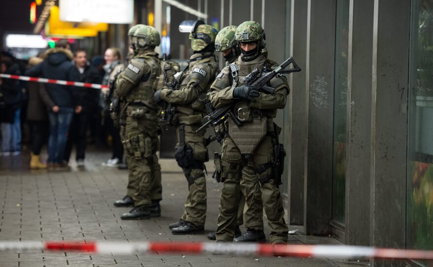 Armed German police on duty at the main railway station in central Munich on New Year's Eve.