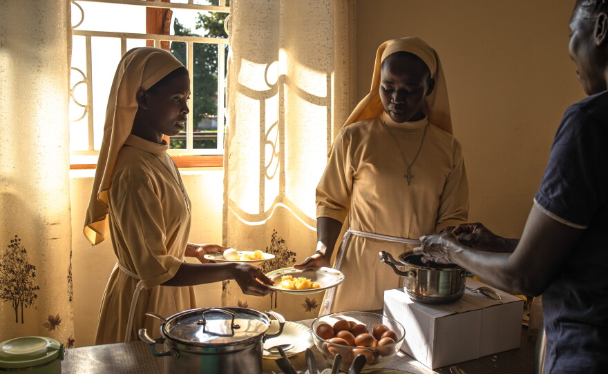 Young nuns prepare to serve breakfast to elderly sisters at the Little Sisters of St. Francis premises.