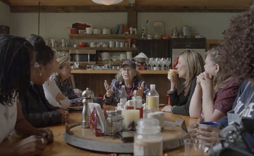 Sister Úna and camp friends gather at a reunion.