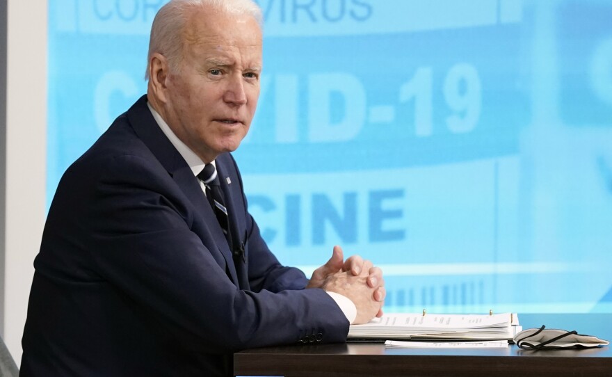 President Joe Biden speaks about the government's COVID-19 response, Jan. 13, 2022. Experts say his administration's efforts have yielded mixed results in the first year Biden's been in office.