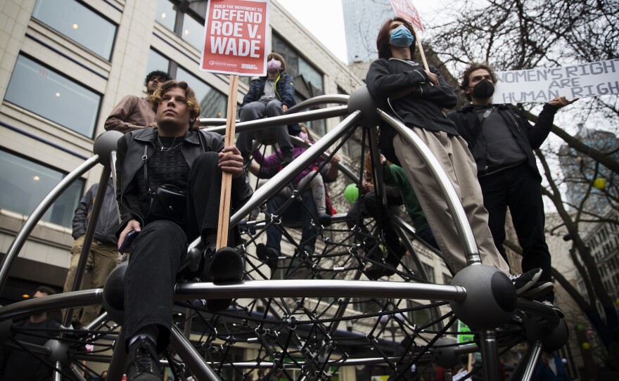 <strong>Seattle</strong>: Michael Behr, left, attends a rally to defend Roe v. Wade