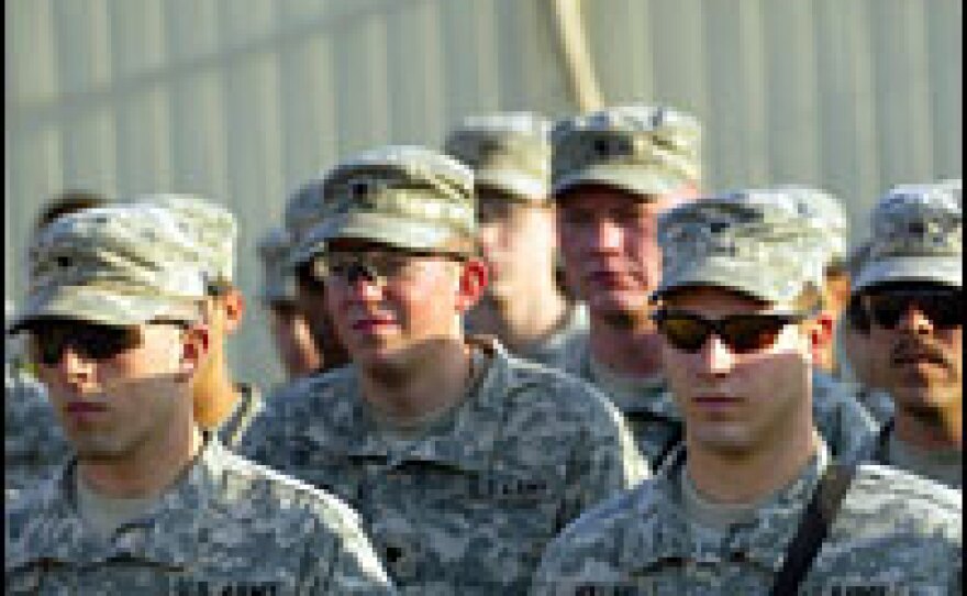 U.S. troops listen to a briefing on the next day's operation Jan. 3 at the War Horse U.S. military base on the outskirts of Baquba, Iraq.