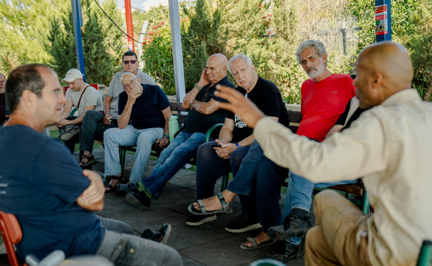 A delegation of retired Israeli military and government officials meet with Eid Salem (right), a local community leader, in the Palestinian village of Umm al-Kheir in the Israeli-occupied West Bank, on Sept. 24, 2026.