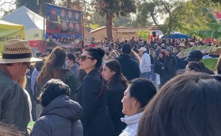 A crowd of visitors flock the food stands in Balboa Park during the Lunar New Year festival on Jan. 22, 2023.