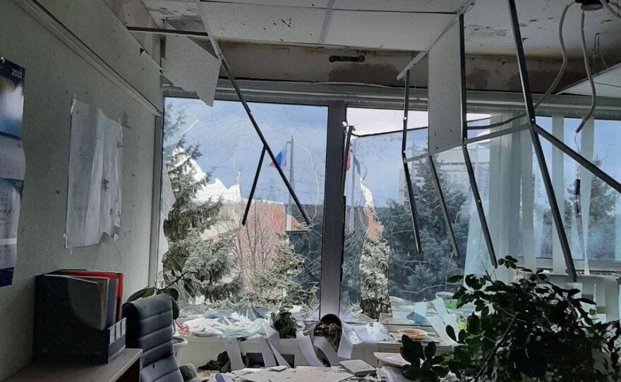 A second office in the main administrative building. A Russian flag and the Soviet-era "Banner of Victory" are visible through the window, indicating the photos were taken after the assault.