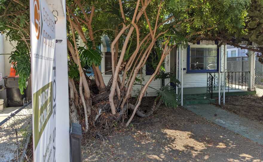 A realtor sign stands outside Ted Williams childhood home in North Park, Aug. 17, 2022.