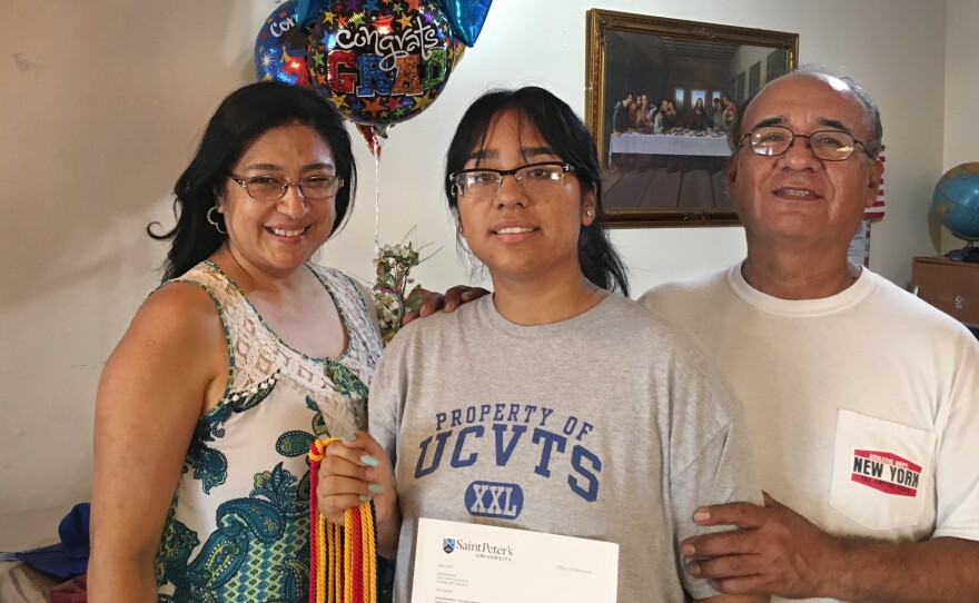 Desiree Armas (center) and her parents, Olga and Carlos Armas, left Peru when Desiree was 3 years old. Her immigration status made finding financial aid for college complicated.