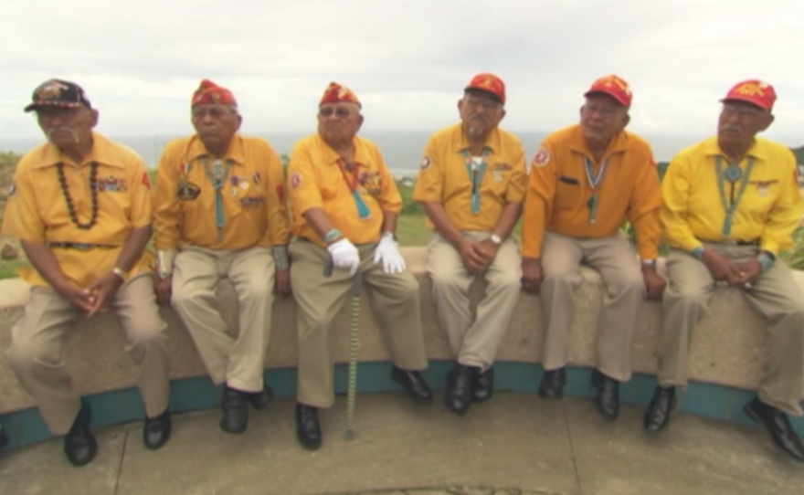 A screenshot from the documentary "Navajo Code Talkers: A Journey of Remembrance" of a group of Navajo code talkers featured in the film.