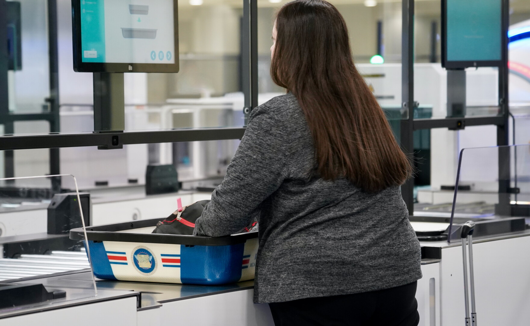Self Checkpoint TSA unveils a prototype self-service airport checkpoint security ...