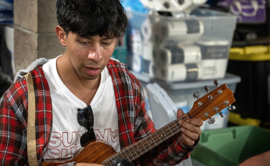 Max Louis is from Oahu and helping those who lost their homes in the wildfires. During some evening gatherings at the property, he plays music.