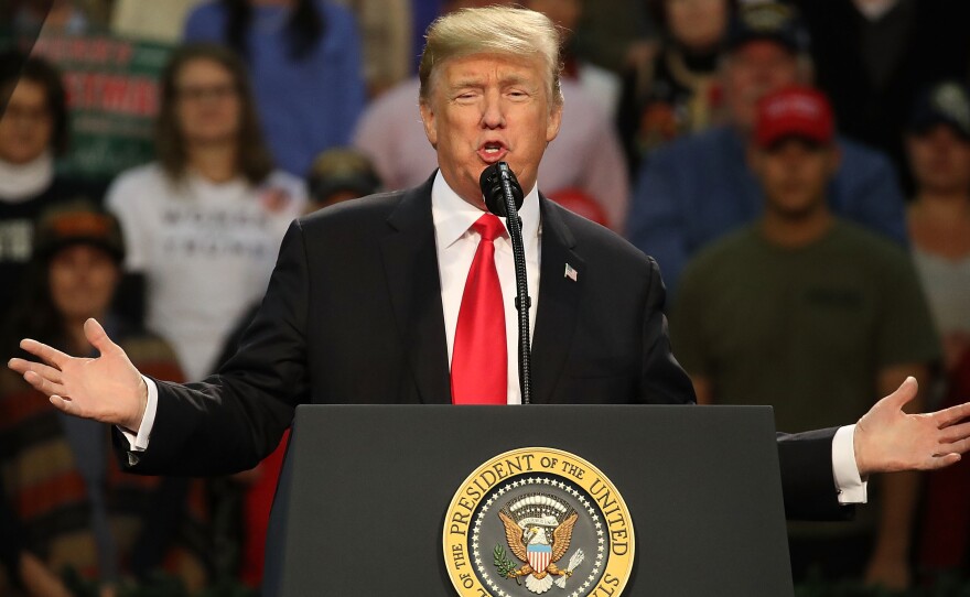 President Donald Trump speaks during a rally on Friday in Pensacola, Fla.