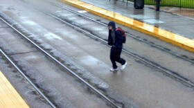 A surveillance image shows missing 16-year-old Crispin Dowell at a trolley station in La Mesa before he went missing. 