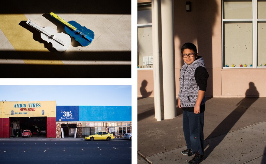 Clockwise from top left: Two cardboard violins lay on the ground; 11-year-old Carlos Garcia poses for a portrait; Downer is in a predominantly low-income district.