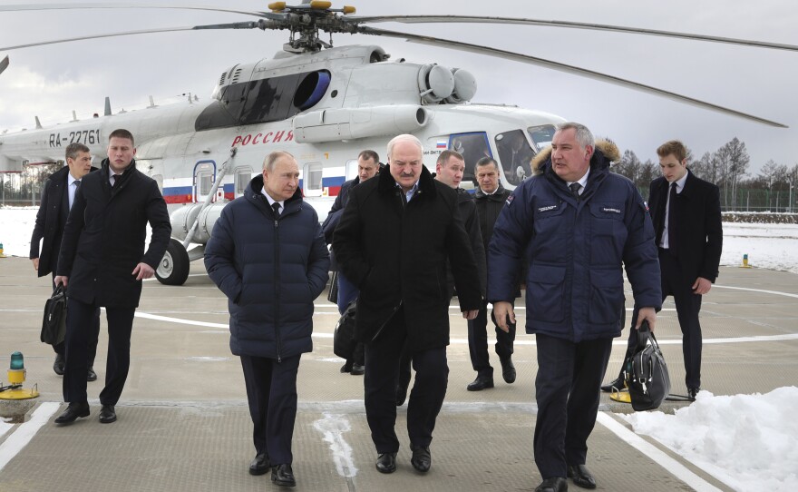 Russian President Vladimir Putin (center left) and Belarusian President Alexander Lukashenko (center right) arrive at Russia's Vostochny Cosmodrome in Russia's Far East on April 12. Among the leaders of the former Soviet republics, Lukashenko has been the staunchest supporter of Putin and Russia's war in Ukraine.