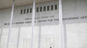 A man wheels a garbage bin outside of The John. F. Kennedy Center for the Performing Arts, Saturday, June 6, 2026, in Washington.