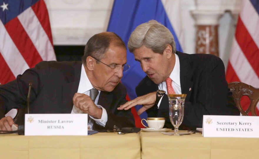 Secretary of State John Kerry talks with Russian Foreign Minister Sergei Lavrov at the State Department in Washington on Friday.