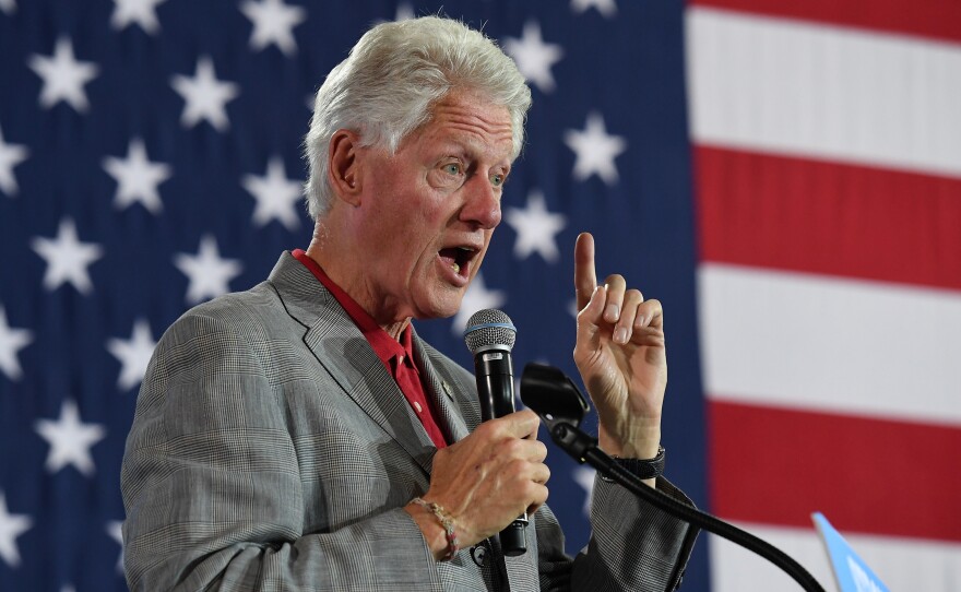 Former President Bill Clinton speaks at a campaign event for Democratic nominee Hillary Clinton at a college campus in Nevada.