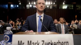 Facebook CEO Mark Zuckerberg arrives to testify before a joint hearing of the Commerce and Judiciary Committees on Capitol Hill in Washington, Tuesday, April 10, 2018, about the use of Facebook data to target American voters in the 2016 election. 