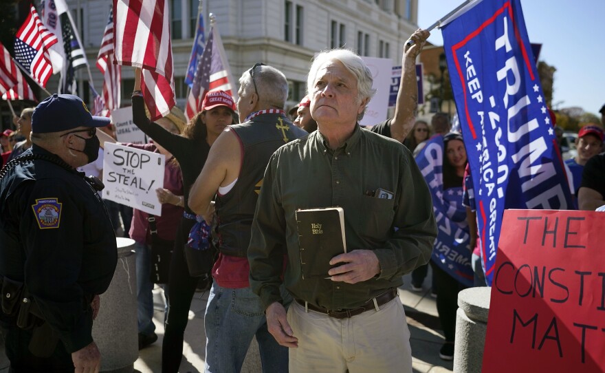 Supporters of President Donald Trump demonstrate outside the Pennsylvania State Capitol, Saturday, Nov. 7, 2020, in Harrisburg, Pa., after Democrat Joe Biden defeated President Donald Trump to become 46th president of the United States.