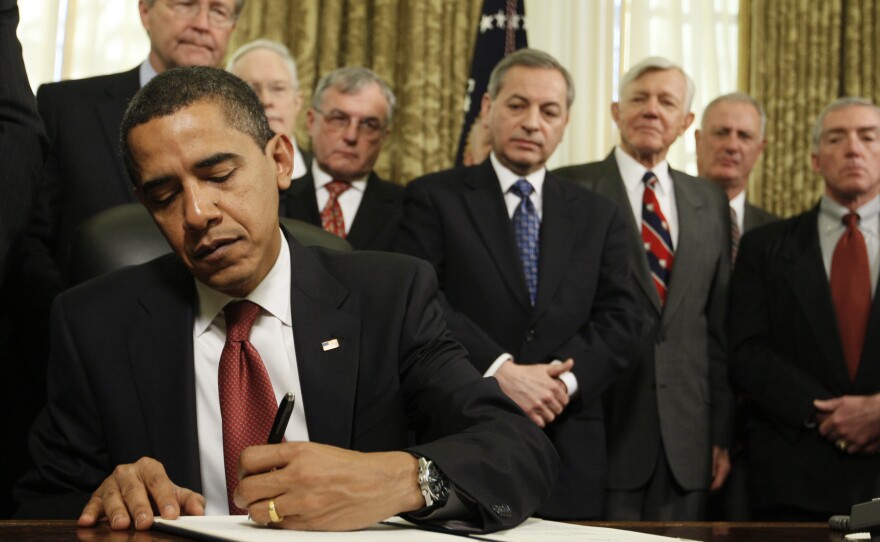 President Obama signs a series of executive orders on Jan. 22, 2009, including one closing the prison at Guantanamo Bay.