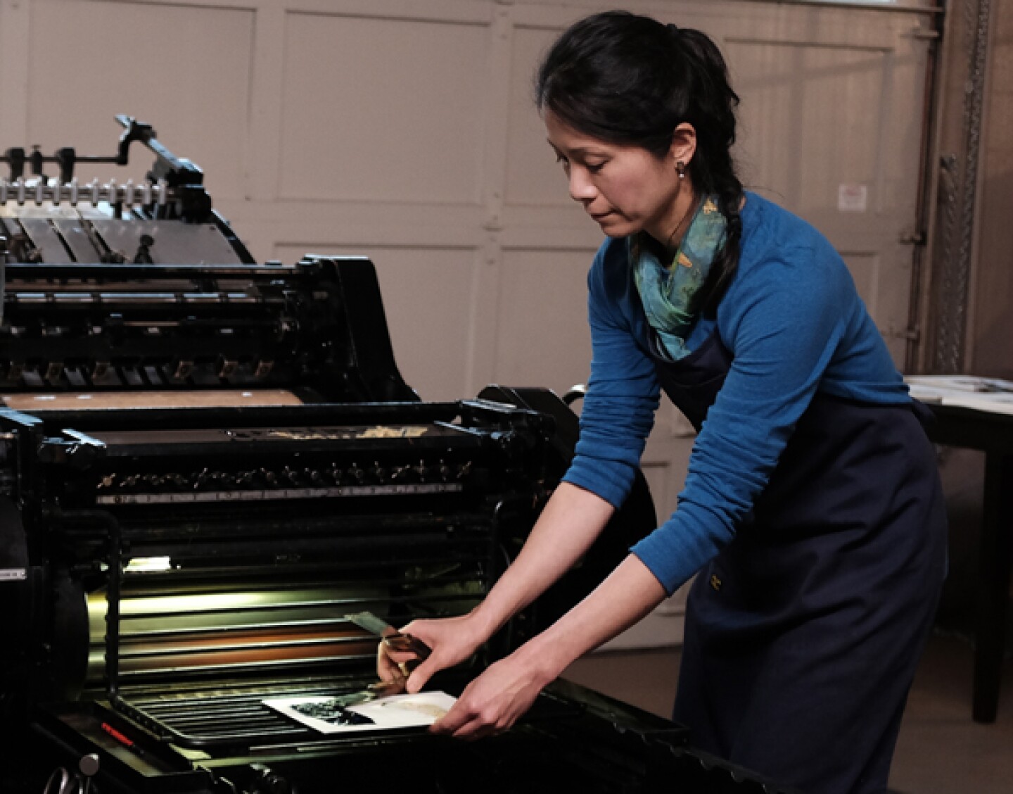 Yoshiko Yamamoto at the printing press.