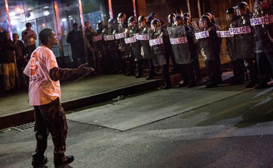 People protesting the death of Freddie Gray and demanding police accountability took to the streets in Baltimore's Sandtown neighborhood again Thursday night.