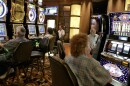 Patrons at the San Manuel Indian Bingo & Casino play slot machines June 8, 2006, on the San Manuel Indian Reservation, Calif.