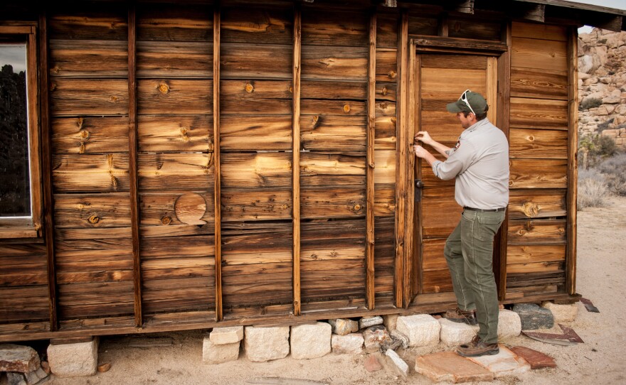 There are more than 150 historical structures at Joshua Tree National Park, like this schoolhouse at Keys Ranch. Jason Theuer's job is to decide which ones to protect and preserve, based on the available resources, and then do just that. He says it feels like being an ambulance driver.