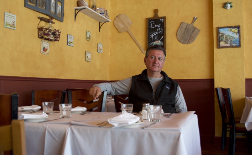 Dario Hadjian, the owner of Taverna Pellegrini in this undated photo, says he had to throw out up to $1,500 worth of food as a result of the PG&E power outage.