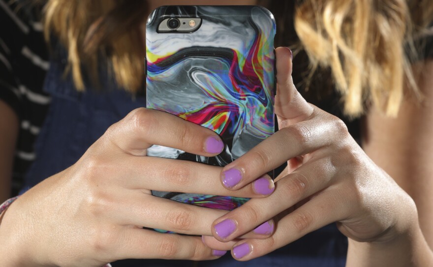Parents and tech companies are both struggling with how to handle underage kids using social media apps.