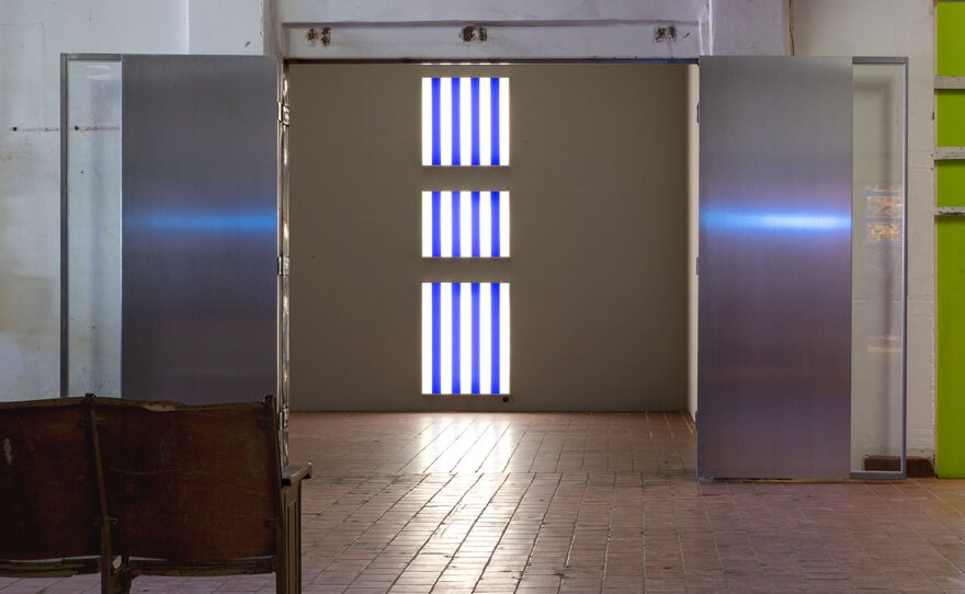 Daniel Buren's "Three Light Boxes for One Wall, 1989" on view at Quint ONE.