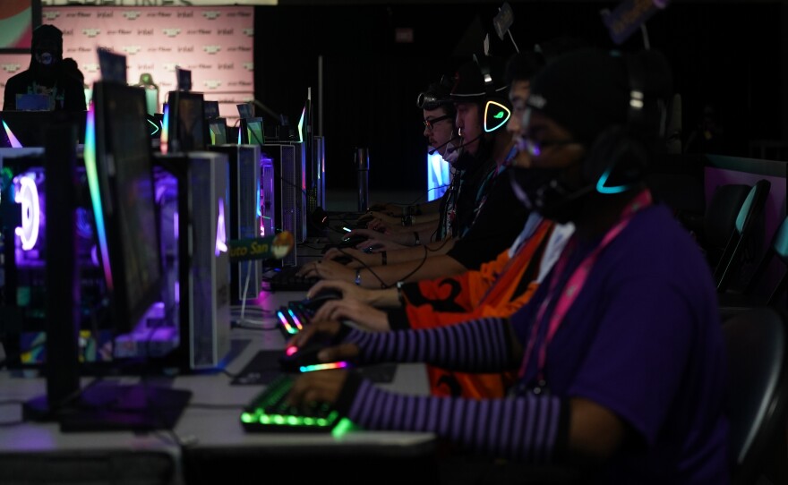 TwitchCon attendees play video games at the TwitchCon LAN at the San Diego Convention Center on Oct. 8, 2022. 