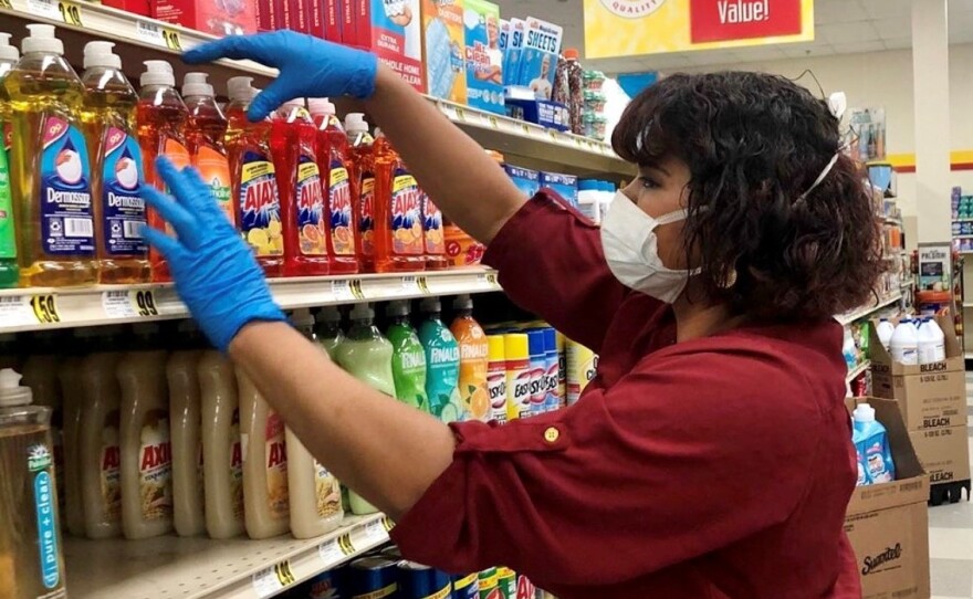 Yesenia Ortiz works at a grocery store in Greensboro, N.C. She says she wishes she would get paid more during the pandemic because of the extra level of risk to which she is exposed.