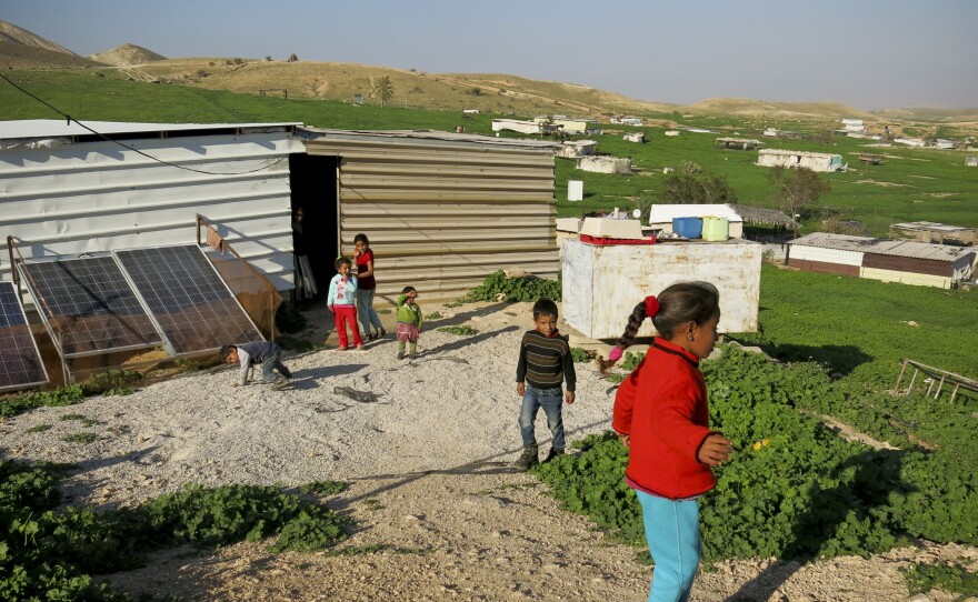 Children play at a Bedouin camp in the Jordan Valley, West Bank. The camp is located in Area C, the 60 percent of the West Bank under exclusive Israeli control.