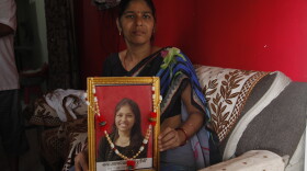 Neelum Chaturvedi holding a picture of her 18-year-old daughter Akanksha, who took her own life in May, soon after authorities cancelled the results of a high-pressure medical exam Akanksha had taken, saying the results had been leaked.