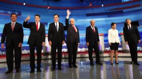 Republican presidential candidates, left to right, Rick Santorum, Rick Perry, Mitt Romney, Newt Gingrich, Ron Paul, Michele Bachmann and Jon Huntsman.
