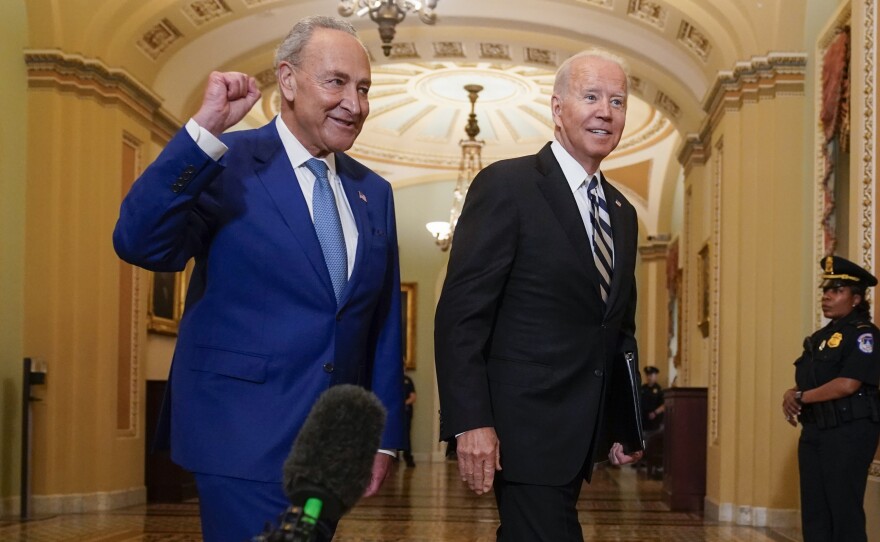 President Biden meets with Senate Majority Leader Chuck Schumer last week to discuss the latest progress on his infrastructure agenda. Schumer has scheduled a key procedural vote Wednesday.