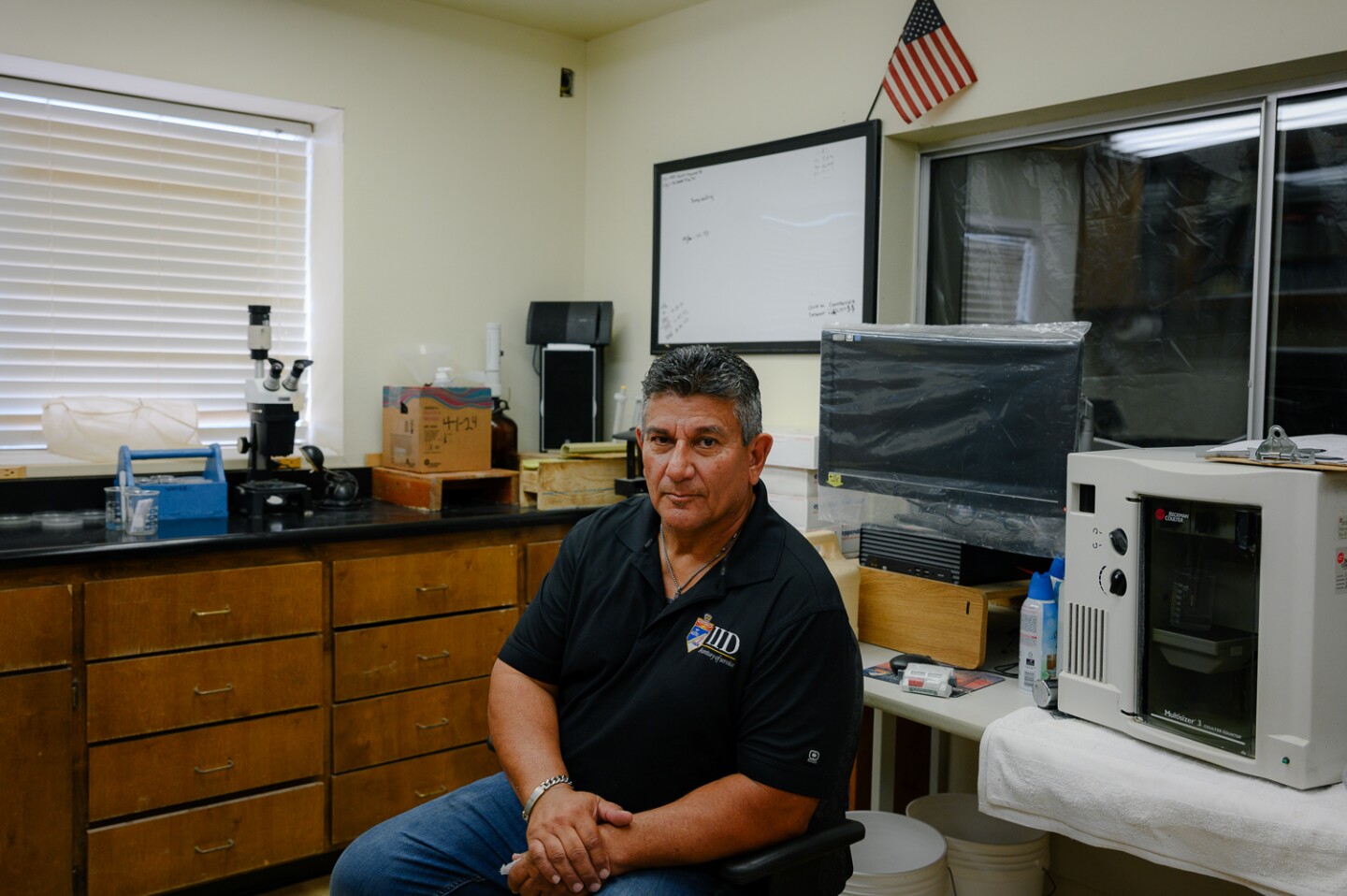 Pablo Cortez, who leads IID's grass carp hatchery operation, sits for a portrait at the hatchery in El Centro in Imperial County on May 7, 2024.