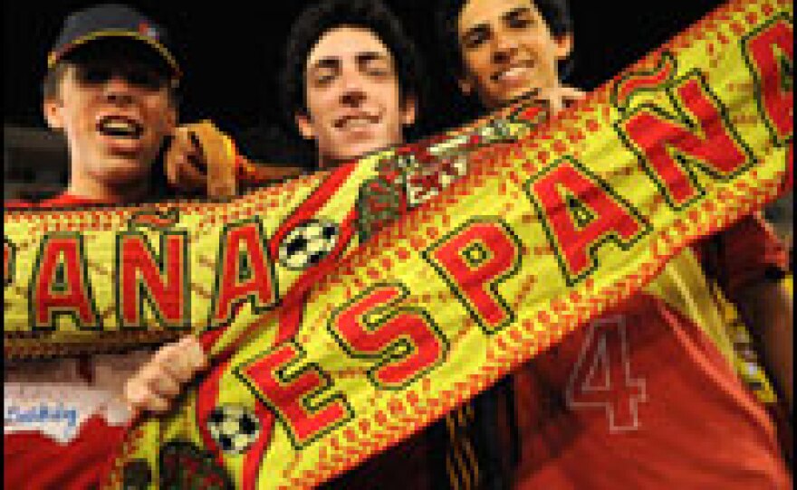 Fans celebrate after Spain wins the final of the Euro 2008 soccer championships.