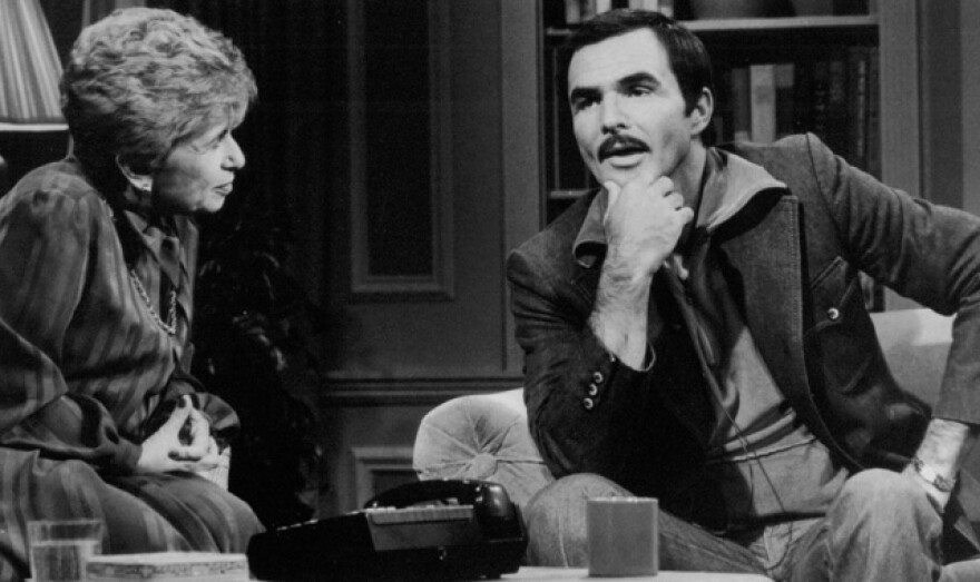 Dr. Ruth with actor Burt Reynolds.