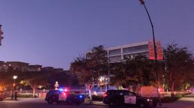 Police cars are parked outside of San Diego Police Department headquarters following an officer-involved shooting, July 5, 2020. 