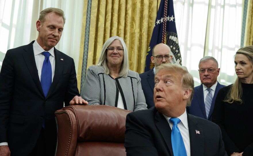 Acting Secretary of Defense Patrick Shanahan listens as President Trump speaks during a signing event for Space Policy Directive 4 in the Oval Office last month.
