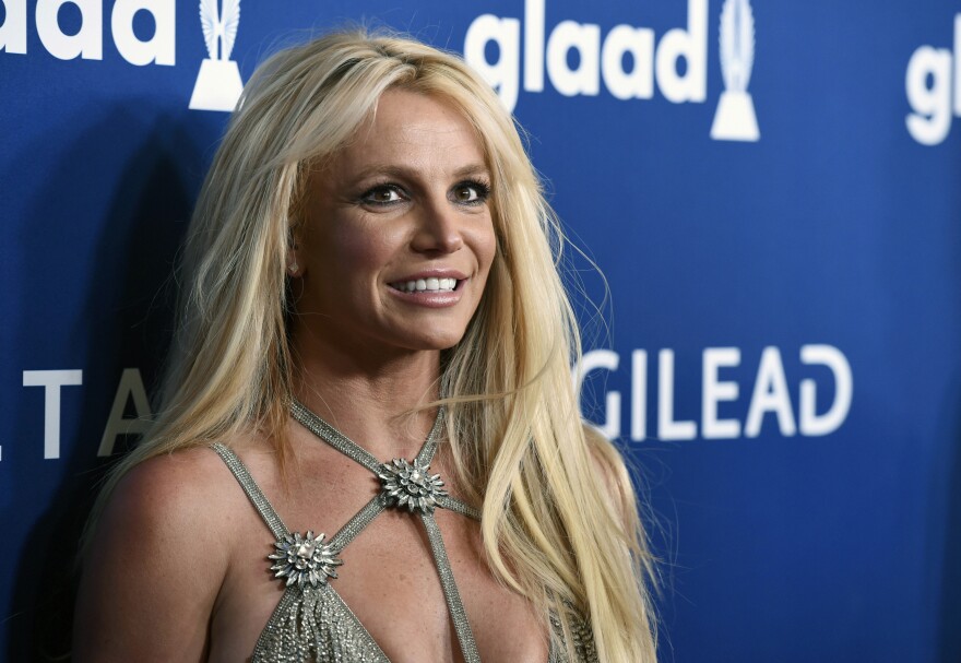 FILE - This April 12, 2018, file photo shows Britney Spears at the 29th annual GLAAD Media Awards in Beverly Hills, Calif. Disability rights activists and advocates for Britney Spears backed a California proposal Wednesday, Jan. 18, 2022, to provide more protections for those under court-ordered conservatorships, while promoting less-restrictive alternatives.  