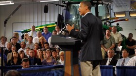 People listen as President Barack Obama speaks during the opening session of the Rural Economic Forum at Northeast Iowa Community College on August 16, 2011 in Peosta, Iowa. 