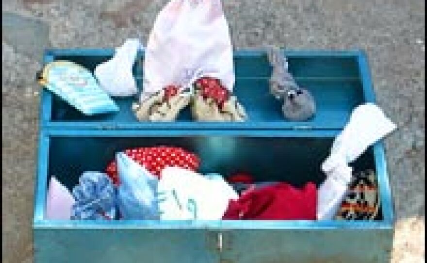 In the rural village of El Gusano, women put their savings in a toolbox. The small bags are sewed by them and have their names stitched on.