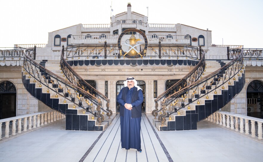 Sheikh Manaa Hamidi al-Jorba, known as the prince of the Shammar, stands at his palace near the Iraqi border.