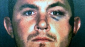 This undated booking photo provided by the San Bernardino County Sheriff's Department shows Francis Jared Pusok, of Apple Valley. 