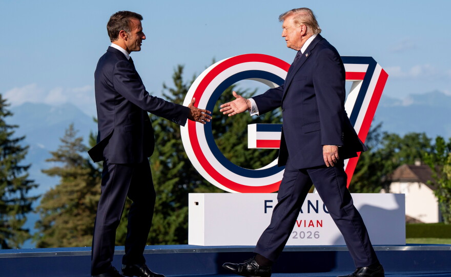 Emmanuel Macron, President of France, left, greets U.S. President Donald Trump during the G7 summit in Evian-les-Bains, France, Monday, June 15, 2026.