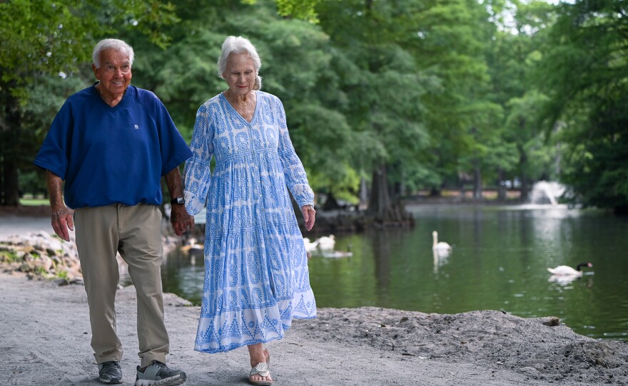 Bobby Richardson (left) and his wife, Betsy Richardson, (right) still hold hands when they take walks through the Swan Lake Gardens in Sumter, S.C.